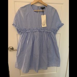 White and blue seersucker romper